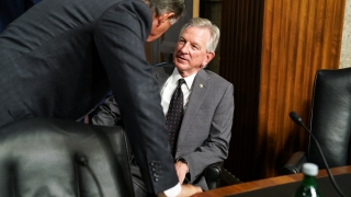 Sen. Tommy Tuberville (R-Ala.) is shown before a Senate Armed Services Committee hearing on July 11, 2023 regarding General Charles Brown's nomination as chairman of the Joint Chiefs of Staff.